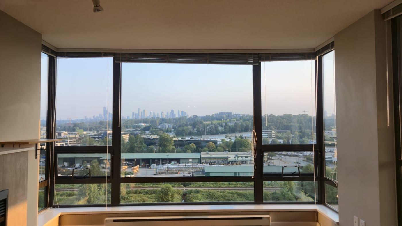 Clean bay windows and sills looking out over the city